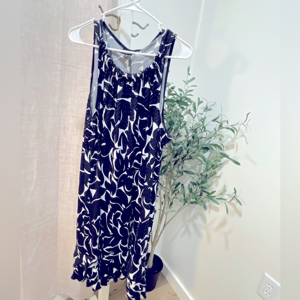 Beautiful dress with texture and sparkle . Ruffled bottom